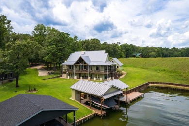 Welcome to 109 King Shore Blvd, a luxury waterfront retreat in on Cypress Creek Country Club in Texas - for sale on GolfHomes.com, golf home, golf lot