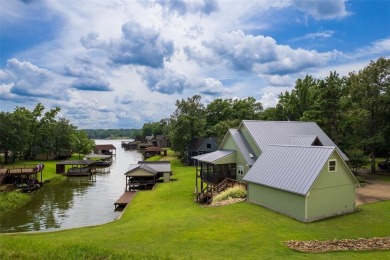 Welcome to 109 King Shore Blvd, a luxury waterfront retreat in on Cypress Creek Country Club in Texas - for sale on GolfHomes.com, golf home, golf lot