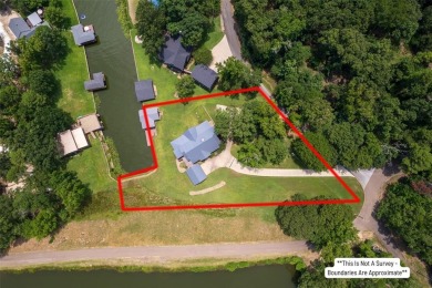 Welcome to 109 King Shore Blvd, a luxury waterfront retreat in on Cypress Creek Country Club in Texas - for sale on GolfHomes.com, golf home, golf lot