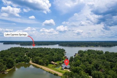 Welcome to 109 King Shore Blvd, a luxury waterfront retreat in on Cypress Creek Country Club in Texas - for sale on GolfHomes.com, golf home, golf lot