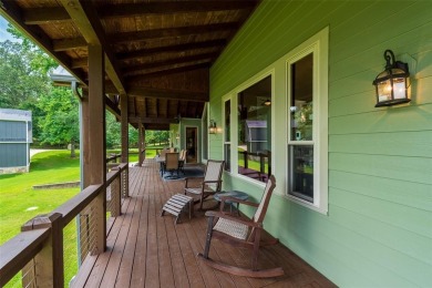 Welcome to 109 King Shore Blvd, a luxury waterfront retreat in on Cypress Creek Country Club in Texas - for sale on GolfHomes.com, golf home, golf lot