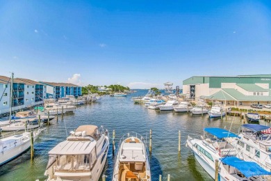 Amazing SUNSET VIEW and WATERFRONT condo located on the top on Lost Key Golf Club in Florida - for sale on GolfHomes.com, golf home, golf lot
