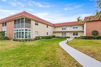 Enjoy easy Florida living in this 2BR/2BA FIRST-FLOOR unit with on The American Golf Club in Florida - for sale on GolfHomes.com, golf home, golf lot