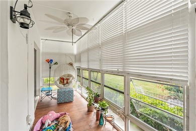 Enjoy easy Florida living in this 2BR/2BA FIRST-FLOOR unit with on The American Golf Club in Florida - for sale on GolfHomes.com, golf home, golf lot