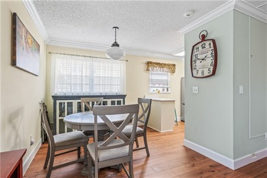 Enjoy easy Florida living in this 2BR/2BA FIRST-FLOOR unit with on The American Golf Club in Florida - for sale on GolfHomes.com, golf home, golf lot