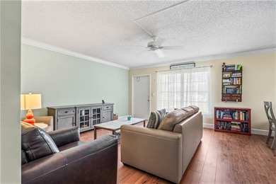 Enjoy easy Florida living in this 2BR/2BA FIRST-FLOOR unit with on The American Golf Club in Florida - for sale on GolfHomes.com, golf home, golf lot