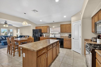 Located in the highly sought-after Johnson Ranch community, this on The Golf Club At Johnson Ranch in Arizona - for sale on GolfHomes.com, golf home, golf lot