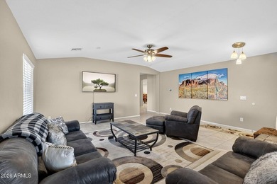 Located in the highly sought-after Johnson Ranch community, this on The Golf Club At Johnson Ranch in Arizona - for sale on GolfHomes.com, golf home, golf lot