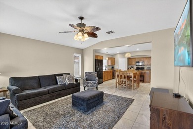 Located in the highly sought-after Johnson Ranch community, this on The Golf Club At Johnson Ranch in Arizona - for sale on GolfHomes.com, golf home, golf lot