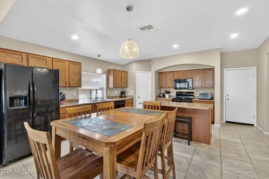 Located in the highly sought-after Johnson Ranch community, this on The Golf Club At Johnson Ranch in Arizona - for sale on GolfHomes.com, golf home, golf lot