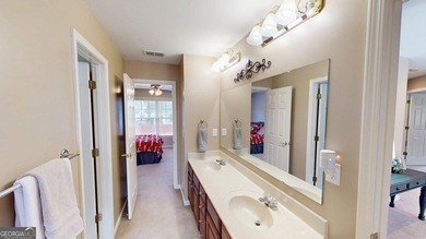 This 4 bedroom 2.5 bath home offers the perfect blend of comfort on Mirror Lake Golf Club in Georgia - for sale on GolfHomes.com, golf home, golf lot