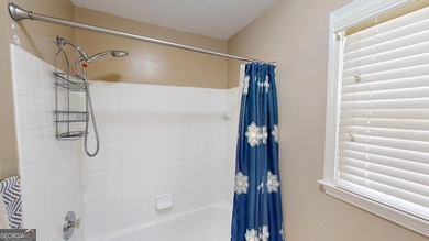 This 4 bedroom 2.5 bath home offers the perfect blend of comfort on Mirror Lake Golf Club in Georgia - for sale on GolfHomes.com, golf home, golf lot