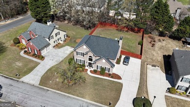 This 4 bedroom 2.5 bath home offers the perfect blend of comfort on Mirror Lake Golf Club in Georgia - for sale on GolfHomes.com, golf home, golf lot