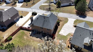 This 4 bedroom 2.5 bath home offers the perfect blend of comfort on Mirror Lake Golf Club in Georgia - for sale on GolfHomes.com, golf home, golf lot