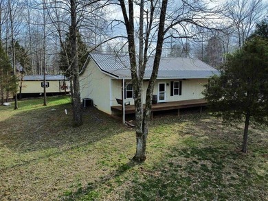 The perfect Rough River Lake property offering space on Rough River Dam State Resort Park Golf Course in Kentucky - for sale on GolfHomes.com, golf home, golf lot