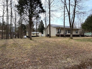 The perfect Rough River Lake property offering space on Rough River Dam State Resort Park Golf Course in Kentucky - for sale on GolfHomes.com, golf home, golf lot