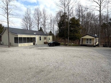 The perfect Rough River Lake property offering space on Rough River Dam State Resort Park Golf Course in Kentucky - for sale on GolfHomes.com, golf home, golf lot