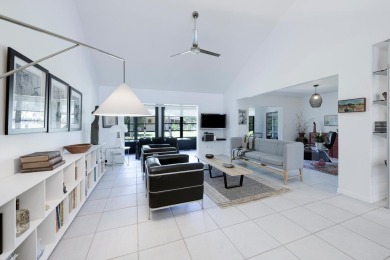 This striking two-bedroom, two-bath plus den Mid-Century design on Heritage Ridge Golf Club in Florida - for sale on GolfHomes.com, golf home, golf lot