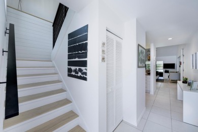 This striking two-bedroom, two-bath plus den Mid-Century design on Heritage Ridge Golf Club in Florida - for sale on GolfHomes.com, golf home, golf lot