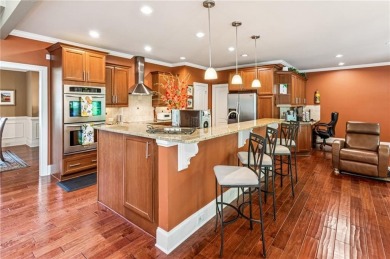 Welcome to Traditions of Braselton, enjoy a beautiful drive thru on Traditions of Braselton Golf Club in Georgia - for sale on GolfHomes.com, golf home, golf lot
