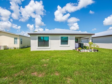 Step into this 2023 Newly Built home on a Land Lease for $831 a on Spanish Lakes Fairways in Florida - for sale on GolfHomes.com, golf home, golf lot