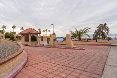 Extremely rare opportunity to live on the island over looking on Bridgewater Links in Arizona - for sale on GolfHomes.com, golf home, golf lot