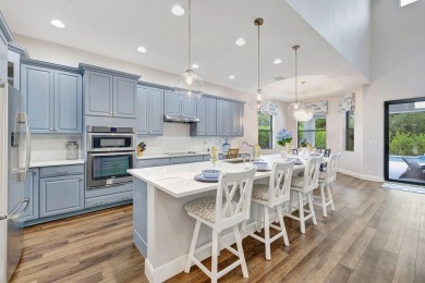 Exquisite two-story pool home, nestled in the prestigious on Parkland Golf Club in Florida - for sale on GolfHomes.com, golf home, golf lot