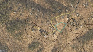 Build your dream home on this 0.78-acre buildable lot in the on Big Canoe Golf Club - Cherokee in Georgia - for sale on GolfHomes.com, golf home, golf lot