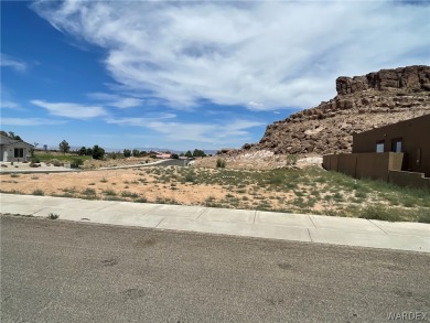 This corner lot features underground utilities to the property on Cerbat Cliffs Golf Course in Arizona - for sale on GolfHomes.com, golf home, golf lot