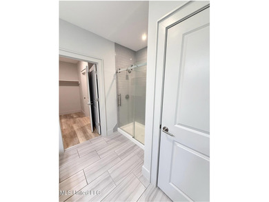 Welcome to Unit 126, a beautifully appointed second-level corner on Gulf Hills Golf Club in Mississippi - for sale on GolfHomes.com, golf home, golf lot