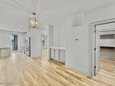 Welcome to Unit 126, a beautifully appointed second-level corner on Gulf Hills Golf Club in Mississippi - for sale on GolfHomes.com, golf home, golf lot