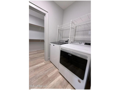 Welcome to Unit 126, a beautifully appointed second-level corner on Gulf Hills Golf Club in Mississippi - for sale on GolfHomes.com, golf home, golf lot