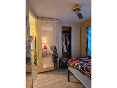 This home is located in the 55+ mobile home community of Anglers on Anglers Green Golf Course in Florida - for sale on GolfHomes.com, golf home, golf lot