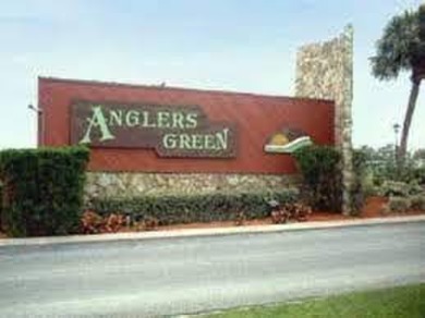 This home is located in the 55+ mobile home community of Anglers on Anglers Green Golf Course in Florida - for sale on GolfHomes.com, golf home, golf lot