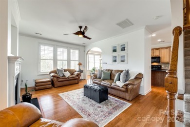 Enjoy the stunning golf course views that this townhome offers on Tega Cay Golf Club in South Carolina - for sale on GolfHomes.com, golf home, golf lot