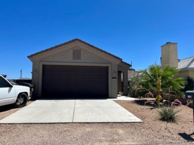 This newer, well maintained 3 bedroom home is within walking on Cerbat Cliffs Golf Course in Arizona - for sale on GolfHomes.com, golf home, golf lot