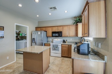 Nestled on a prime  interior lot in the esteemed Johnson Ranch on The Golf Club At Johnson Ranch in Arizona - for sale on GolfHomes.com, golf home, golf lot