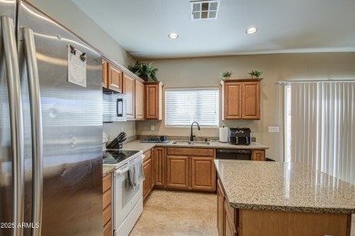 Nestled on a prime  interior lot in the esteemed Johnson Ranch on The Golf Club At Johnson Ranch in Arizona - for sale on GolfHomes.com, golf home, golf lot