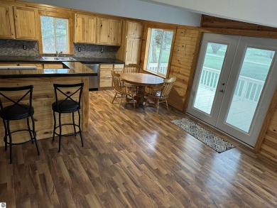 Very nicely updated story and a half home overlooking the Pine on Pine River Golf Club in Michigan - for sale on GolfHomes.com, golf home, golf lot