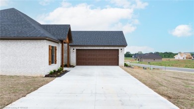 Welcome to 201 Twisted Oak Way, a beautifully designed 3-bedroom on Vache-Grasse Country Club in Arkansas - for sale on GolfHomes.com, golf home, golf lot