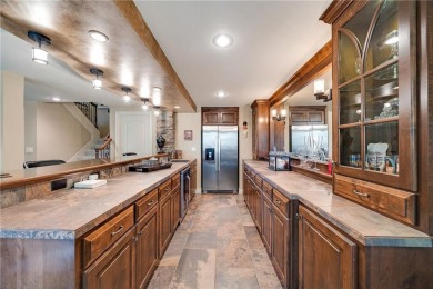 Luxury home in the gated community of Loch Lloyd.  Meticulously on Loch Lloyd Country Club in Missouri - for sale on GolfHomes.com, golf home, golf lot