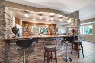 Luxury home in the gated community of Loch Lloyd.  Meticulously on Loch Lloyd Country Club in Missouri - for sale on GolfHomes.com, golf home, golf lot