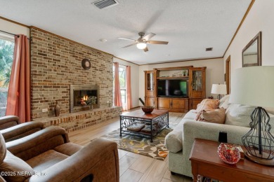 Nestled in a serene setting, this charming home offers a perfect on Blue Cypress Golf Club in Florida - for sale on GolfHomes.com, golf home, golf lot