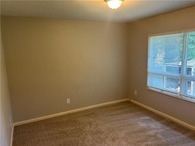 This charming 4-bedroom 3-bath home is perfect for a growing on Hidden Hills Country Club in Georgia - for sale on GolfHomes.com, golf home, golf lot