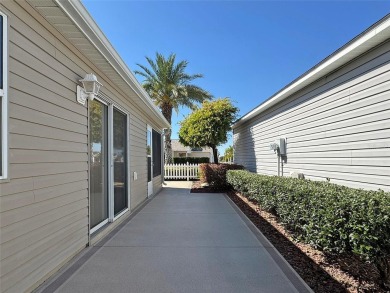 Experience the charm of this BARELY LIVED-IN cozy *Cabot Cove* on The Links of Spruce Creek in Florida - for sale on GolfHomes.com, golf home, golf lot