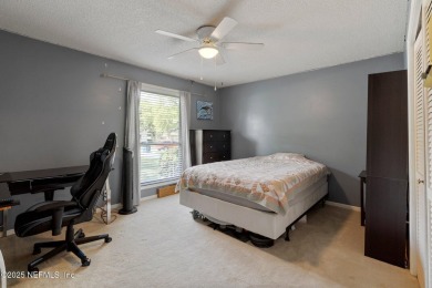 Nestled in a serene setting, this charming home offers a perfect on Blue Cypress Golf Club in Florida - for sale on GolfHomes.com, golf home, golf lot