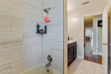 Nestled in a serene setting, this charming home offers a perfect on Blue Cypress Golf Club in Florida - for sale on GolfHomes.com, golf home, golf lot