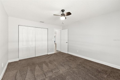 This lovely home is located in the very desirable Cypress Knoll on The Grand Club Cypress Course in Florida - for sale on GolfHomes.com, golf home, golf lot
