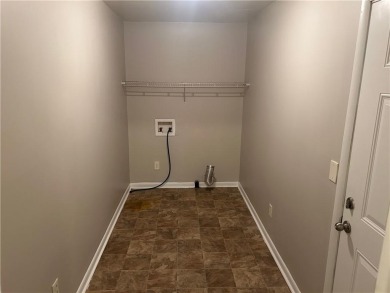 This charming 4-bedroom 3-bath home is perfect for a growing on Hidden Hills Country Club in Georgia - for sale on GolfHomes.com, golf home, golf lot
