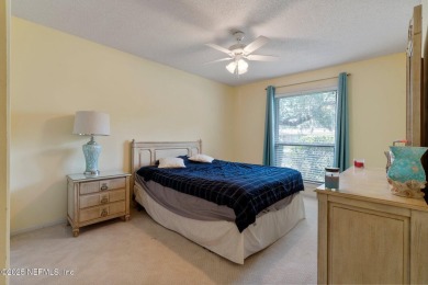 Nestled in a serene setting, this charming home offers a perfect on Blue Cypress Golf Club in Florida - for sale on GolfHomes.com, golf home, golf lot